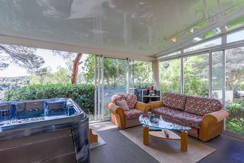 Executive Apartment, 1 Queen Bed, Smoking, Pool Access | Living area | 81-cm flat-screen TV with digital channels