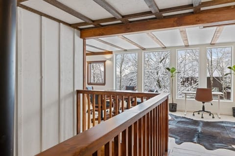 Spacious loft overlooks the office space – perfect for views.