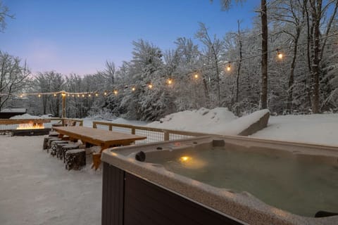 Soak your cares away in the private hot tub after a day on the slopes.