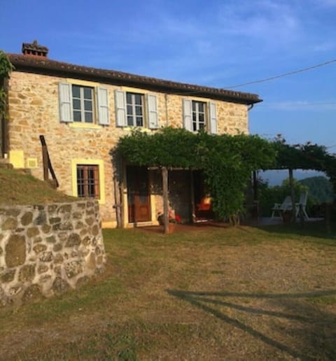 Front of house and terrace
