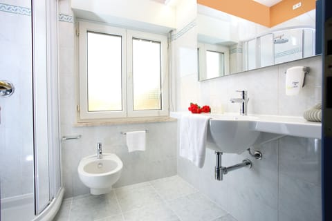 Panoramic Single Room, Sea View | Bathroom | Shower, hair dryer, slippers, bidet