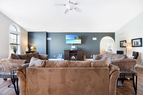 An electric fireplace makes for a cozy evening.