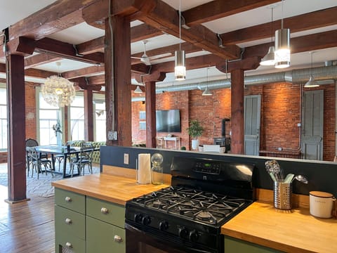 The kitchen is open and overlooks the entire second floor