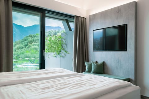 Premium bedding, down comforters, pillowtop beds, minibar