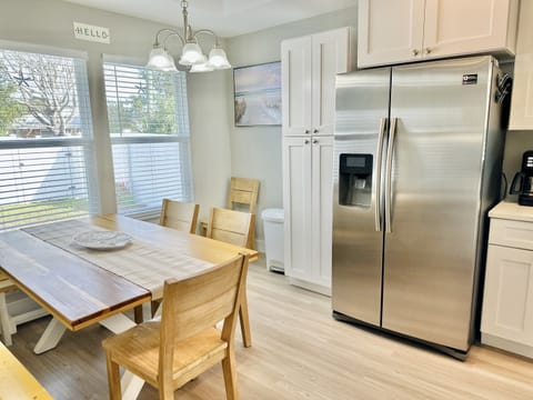 Dining table with seating for shared meals and family gatherings.