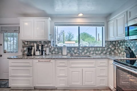 Enjoy the mountain views from the kitchen window. Extremely well stocked kitchen for the most discerning cook. Perfect triangle of access for ease of baking and cooking.