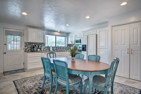 Large open concept Kitchen & Dining space! Custom vintage dining room table is great for gathering for meals.