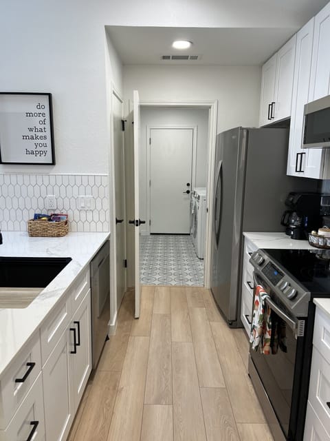 Brand new Kitchen leading to laundry room.