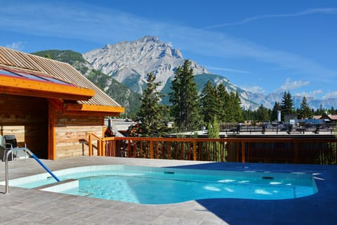 Soak in the shared outdoor hot tub!