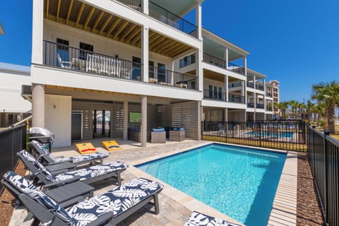 Exclusive VIP Poolside Lounge equipped with an outdoor TV, reserved exclusively for Blue Octopus groups!