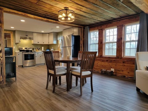 The brand new kitchen is open to the dining and living spaces