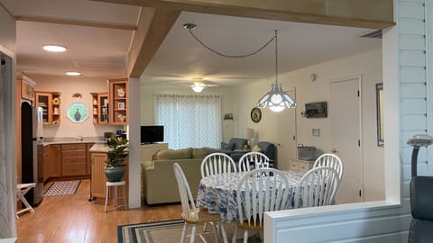 Open floor plan with dining area, living room and kitchen