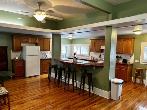 Full kitchen with island dining