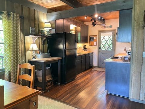 A well-stocked kitchen with tons of cooking supplies & storage space.