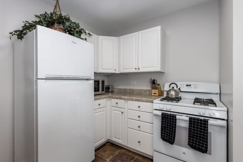 Kitchen cabinets & drawers have everything you need to cook for your group. 