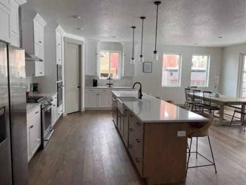 Fully stocked kitchen and dining table that can seat 12. 