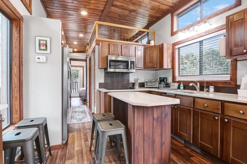 Full kitchen with bar seating