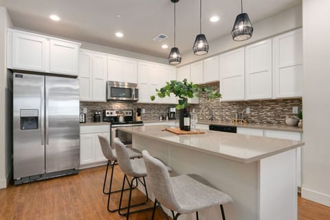 Townhome, Multiple Beds, Patio | Private kitchen | Fridge, microwave, oven, stovetop