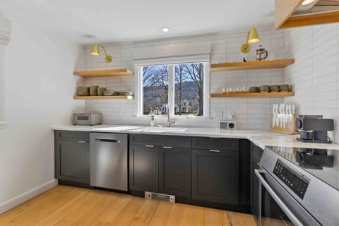 Modern kitchen with brand new appliances and mountain views right out your window!