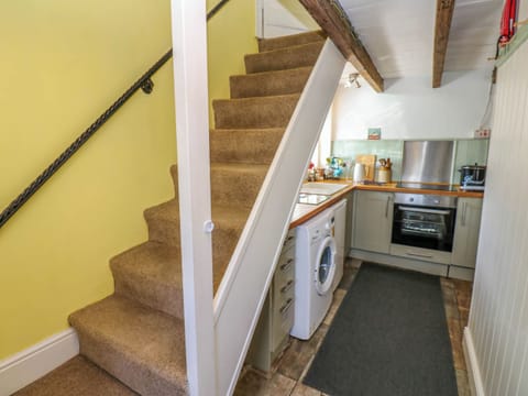 Fridge, electric kettle, toaster, cookware/dishes/utensils