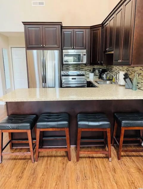 updated and stocked fully functional kitchen with seating for 4. 