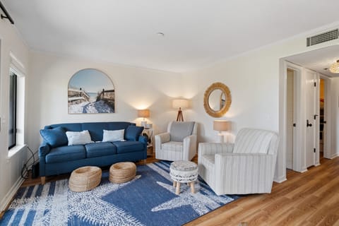 Living room with queen size sofa sleeper. Mattress topper for added comfort