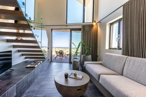 Premium Duplex Suite | Living room | 39-inch Smart TV with satellite channels, TV, tablet