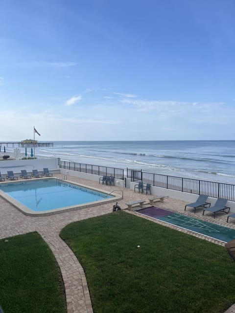 Heated Pool with chairs and direct beach access