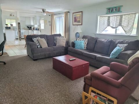 Spacious living room, dining area and kitchen.
