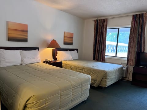 Deluxe Double Room, 2 Queen Beds | Desk, blackout drapes, free cribs/infant beds, rollaway beds