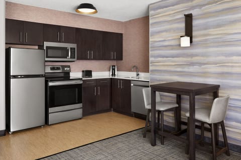 Suite, 1 Bedroom | Private kitchen | Full-size fridge, microwave, stovetop, dishwasher