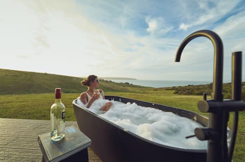 Luxury Cabin | Bathroom | Separate tub and shower, deep soaking tub, hair dryer, slippers