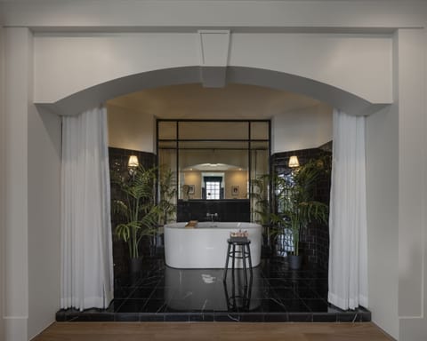 Suite | Bathroom | Separate tub and shower, rainfall showerhead, free toiletries