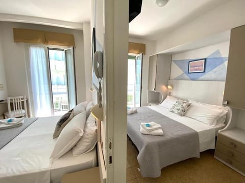 Desk, laptop workspace, free WiFi, bed sheets