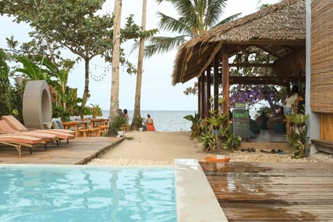 On the beach, sun loungers, beach towels, beach yoga