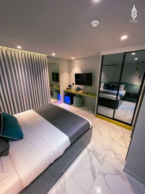 Premium Double Room | Minibar, in-room safe, laptop workspace, blackout drapes