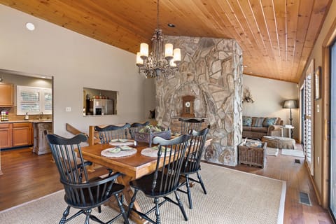 Dining Room with Tongue-and-Groove Ceilings and Hardwood Floors