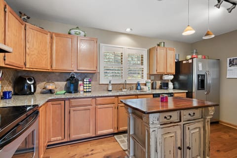 Kitchen with Ample Cabinet Space and an Island for Extra Prep Space