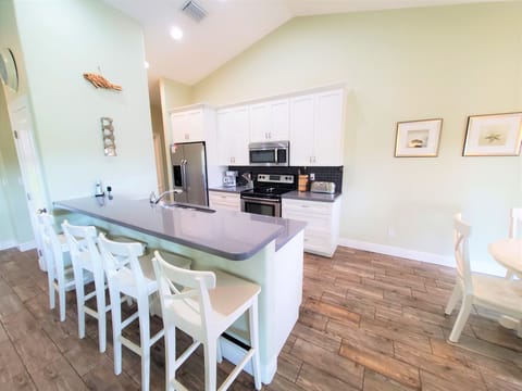 Coconut Place kitchen with eating bar