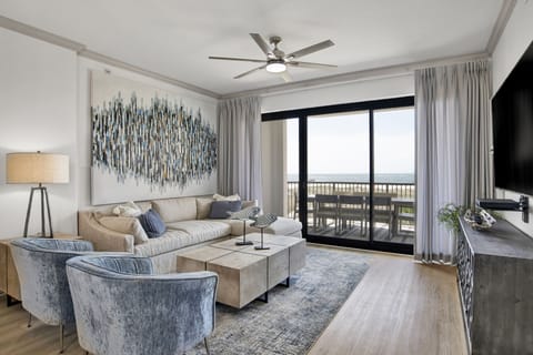 Professionally decorated living room perfect for relaxing with panoramic view!