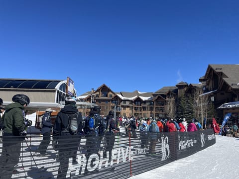 Independence Superchair with resort in background 
