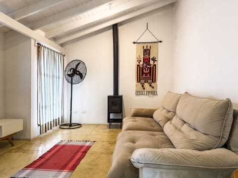 Basic Villa | Living area | 50-inch TV with cable channels