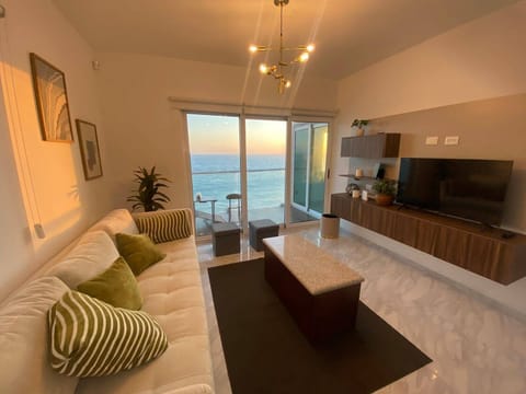 Family Condo | Living area | 35-inch TV with cable channels