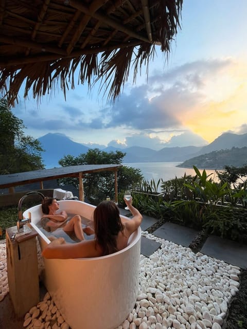 Enjoy totally private outdoor bathroom with a great lake view. 