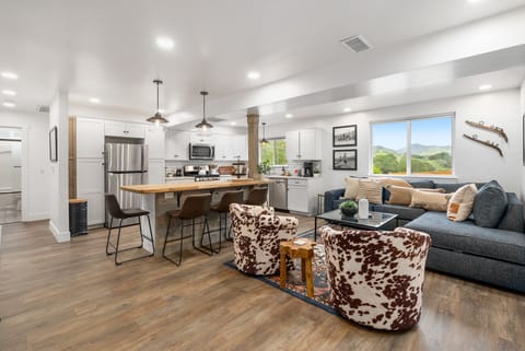 Gather around the island with mountain views beyond