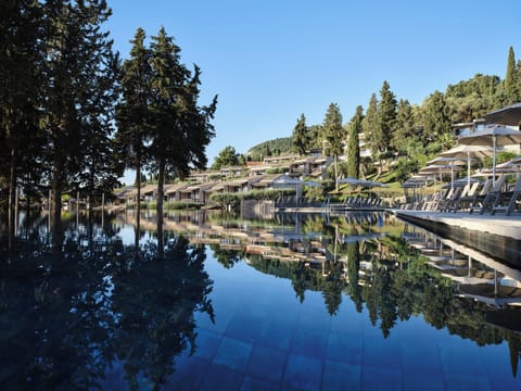 2 outdoor pools, pool umbrellas, sun loungers
