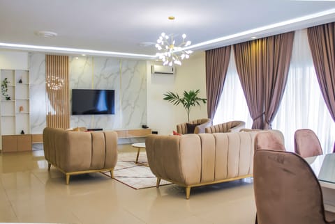 Exclusive Apartment | Living area | Flat-screen TV