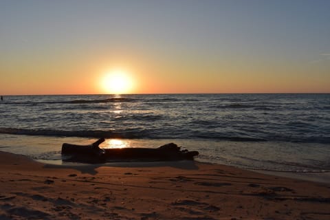 Private Sandy Beach, with gorgeous sunsets, minutes from the condo!