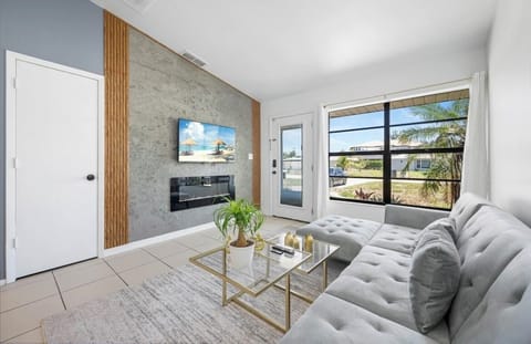 Living Room area with a sofa bed and smart tv with Netflix 