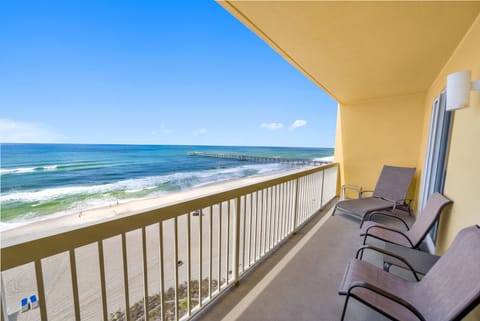Step onto your private balcony and soak in breathtaking oceanfront views, where endless blue waters meet pristine sandy shores just beyond your doorstep.